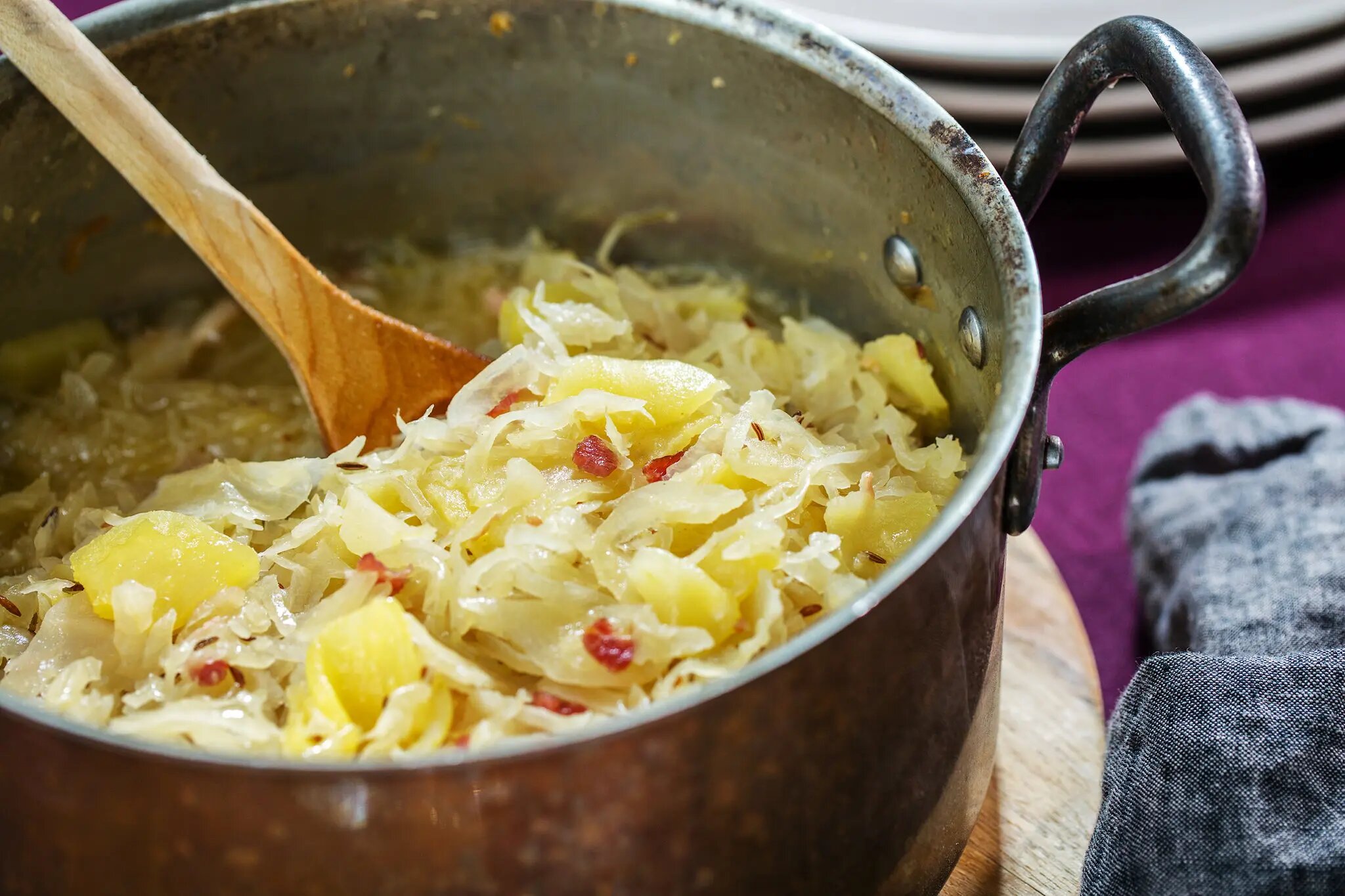 Stewed Sauerkraut (Geschmortes Sauerkraut) with sour apple and white wine – a classic side dish of German cuisine. (Source: cooking.nytimes.com)